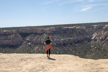 person walking in the desert