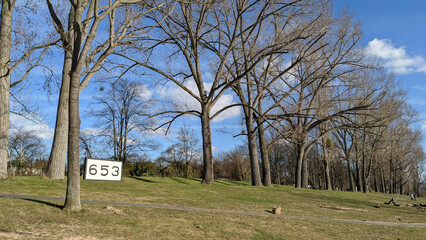 Distance marker in a park at the Rhine river in Bonn, Germany