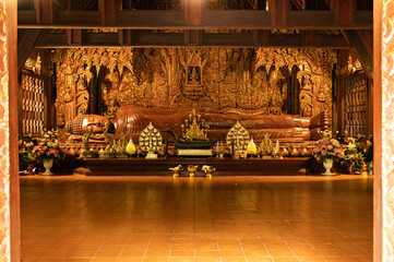 The Wooden Reclining Buddha of Wat Luang Khun Win in Chiangmai Province