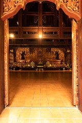 The Wooden Reclining Buddha of Wat Luang Khun Win in Chiangmai Province