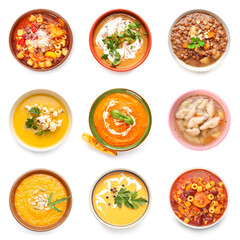 Set of tasty soups in bowls on white background, top view