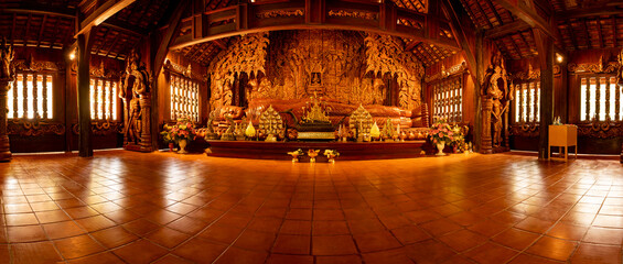 Panorama Image of Reclining Buddha and Beautiful Wooden Building at Wat Luang Khun Win