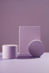 Front view of circle podium decorated in purple background 