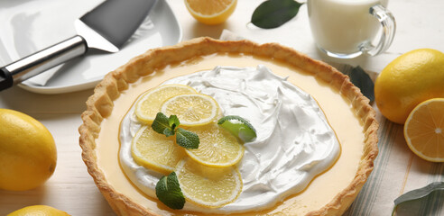 Delicious lemon tart on table