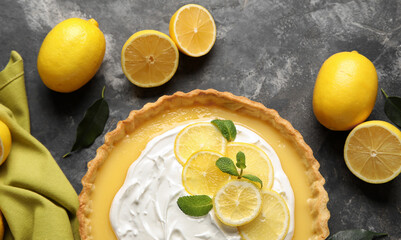 Delicious lemon tart on dark background