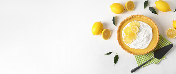 Delicious lemon tart on light background with space for text