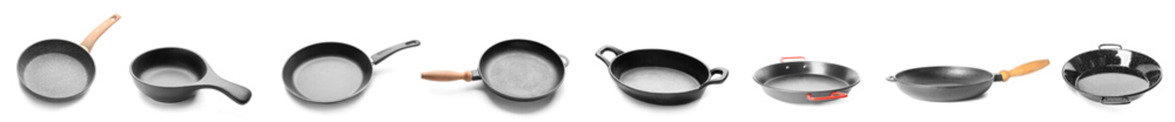 Set of empty frying pans on white background