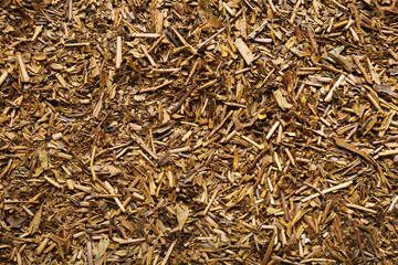 Heap of hojicha green tea as background, closeup