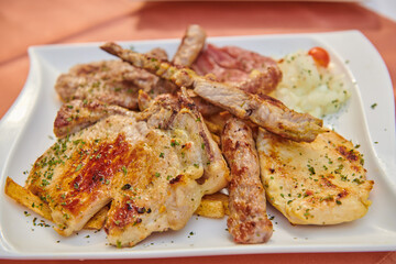 assorted different types of meat on a plate