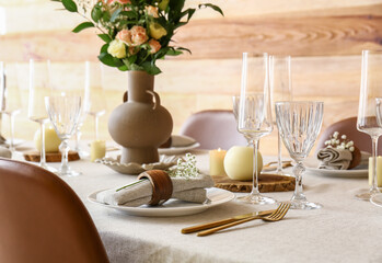 Beautiful table setting for wedding celebration in dining room