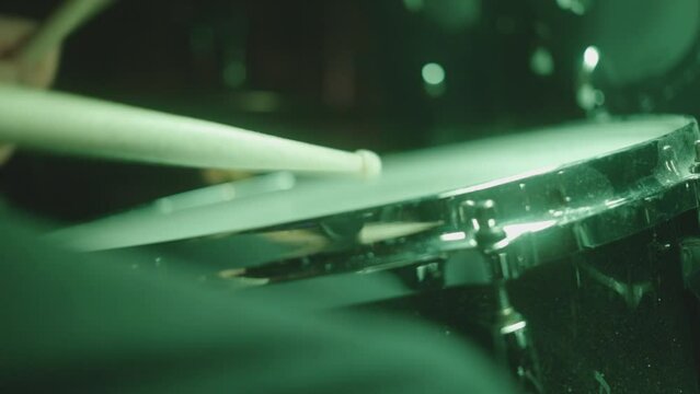 Close Up Of Drummer Beating Drum In A Live Performace.