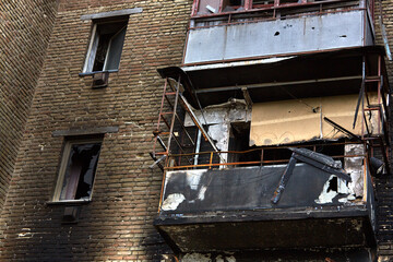 War of Russia against Ukraine. A residential building damaged by an enemy aircraft in the Ukrainian. Consequences of the war, damaged grocery market by the troops of the Russian army.