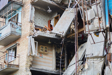 War of Russia against Ukraine. A residential building damaged by an enemy aircraft in the Ukrainian. Consequences of the war, damaged grocery market by the troops of the Russian army.