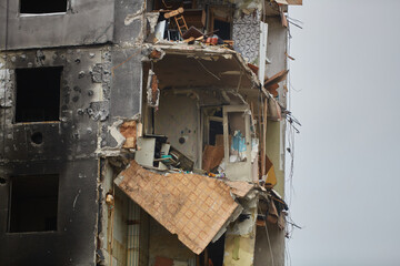 War of Russia against Ukraine. A residential building damaged by an enemy aircraft in the Ukrainian. Consequences of the war, damaged grocery market by the troops of the Russian army.