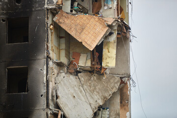 War of Russia against Ukraine. A residential building damaged by an enemy aircraft in the Ukrainian. Consequences of the war, damaged grocery market by the troops of the Russian army.