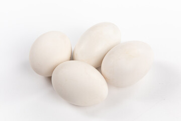 Fresh goose eggs isolated on white background