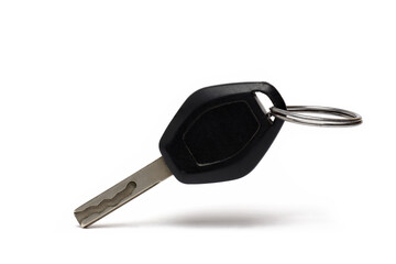 Closeup car key ring shadow white background