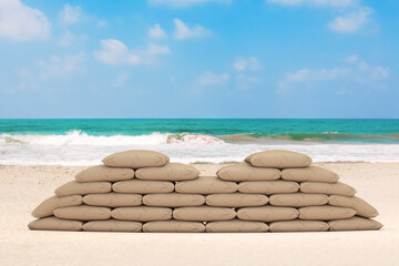 Stacked Sandbag Barricade Shield on an Ocean Sand Beach. 3d Rendering