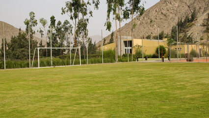 Soccer field with grass in summer Cieneguilla, Lima, Peru