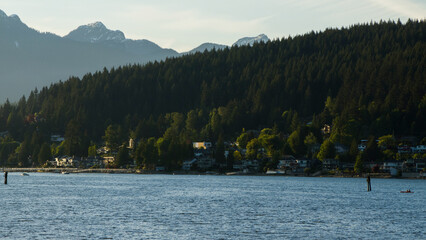 Forest filled mountains and lake in port moody Vancouver Canada