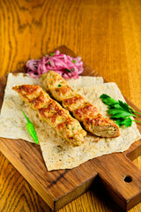 Juicy toasted kebab gyroscopic sausage Lyulya Minced