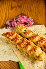 Juicy toasted kebab gyroscopic sausage Lyulya Minced