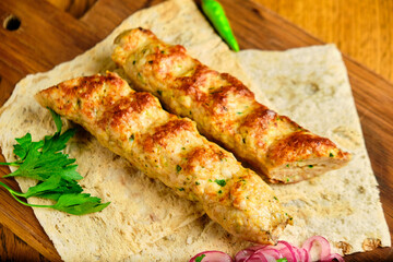 Juicy toasted kebab gyroscopic sausage Lyulya Minced
