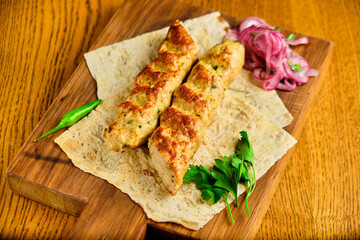 Juicy toasted kebab gyroscopic sausage Lyulya Minced