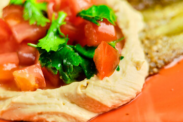 Green Risotto on a white restaurant plate.