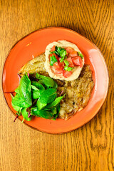 Pasta tartare with basil leaves