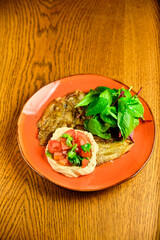 Pasta tartare with basil leaves