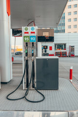 Car refueling. Gas station. A hose for filling the car with gasoline.