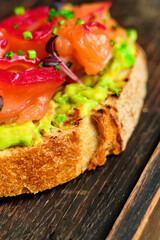 Bruschetta with avocado red fish