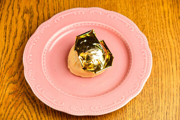 Dessert cake with gold foil
