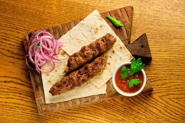 Juicy toasted kebab gyroscopic sausage Lyulya Minced