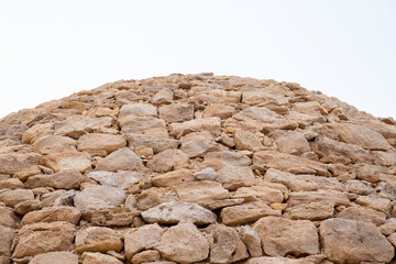 circular tombs with domes in Arabian desert build with rocks