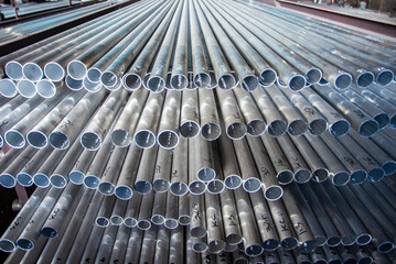 Aluminum pipe products for various needs in a warehouse in an aluminum processing factory.