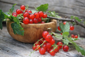 red currant on a wooden table