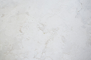 artistic plaster on a gray and white wall. Repairs. elements of wall decor. copy space. texture. background.