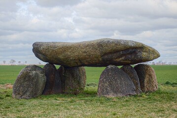 Dramatic shot of megalithic tomb Teufelskeller (lit. devils cellar) near Drosa in Germany