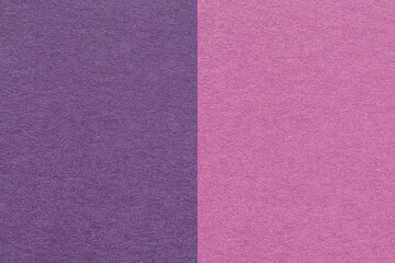 Texture of craft purple and lilac paper background, half two colors, macro. Structure of vintage dense violet cardboard.