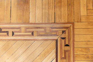 Old oak wood decorative floor, repeat pattern. Parquet detail background, texture, overhead