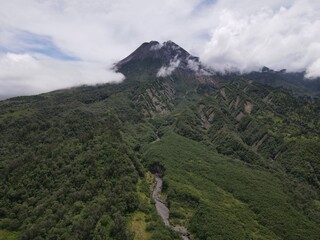 Aerial view of active Merapi mountain with clear sky in Indonesia