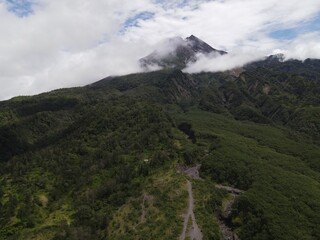 Aerial view of active Merapi mountain with clear sky in Indonesia