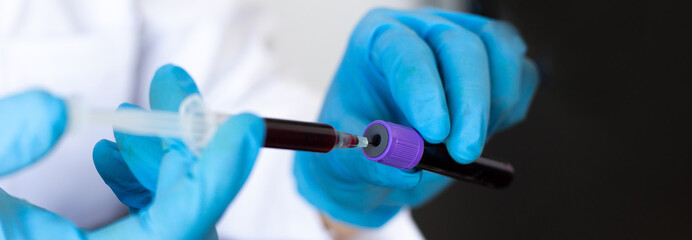 Scientists or doctors collect blood samples from new strains of virus patients for analysis and vaccination in the research laboratory, Vaccine research to eliminate viruses concept.
