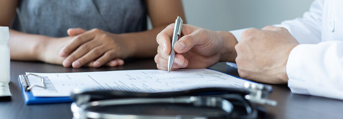Doctor is currently consulting about the treatment of the patient's disease, Disease diagnosis and medical consultation concept.