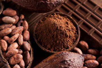 Cocoa pod and chocolate bar and food dessert background