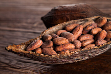 Cocoa pod on wooden background