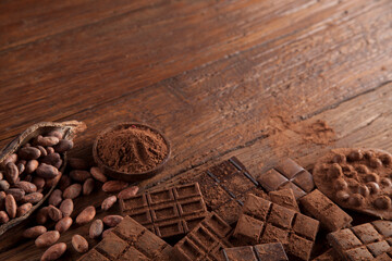 Chocolate bar, candy sweet, dessert food on wooden background