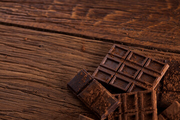 Bars Chocolate , candy sweet, dessert food on wooden background